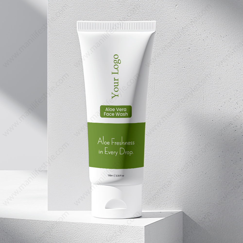 Aloe vera face wash product tube next to a fresh aloe vera leaf